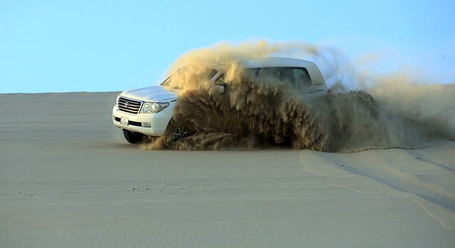 Driving through the desert in Qatar