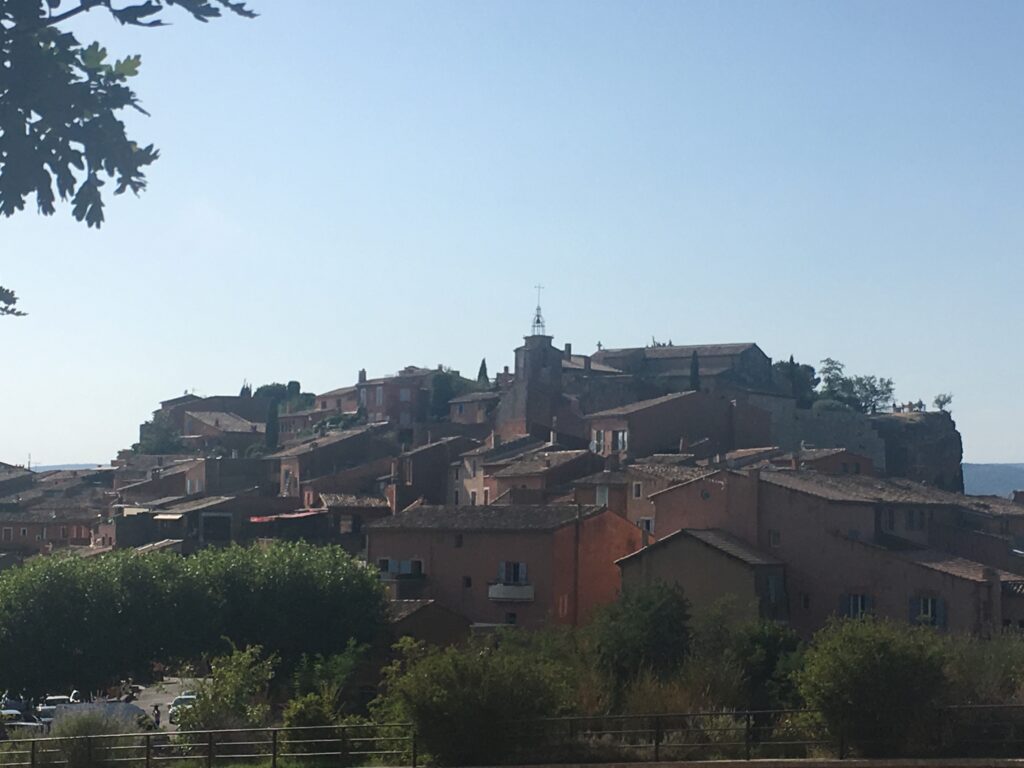 Red stone buildings in Roussillon in France
Copyright © letsexplorehere.com