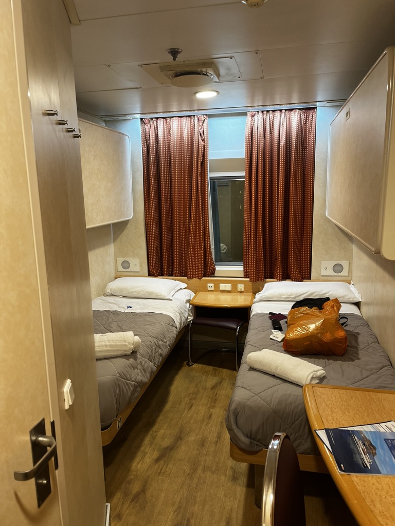 An outside cabin with a window on the ferry from Sardinia to Naples, Italy
Copyright © letsexplorehere.com