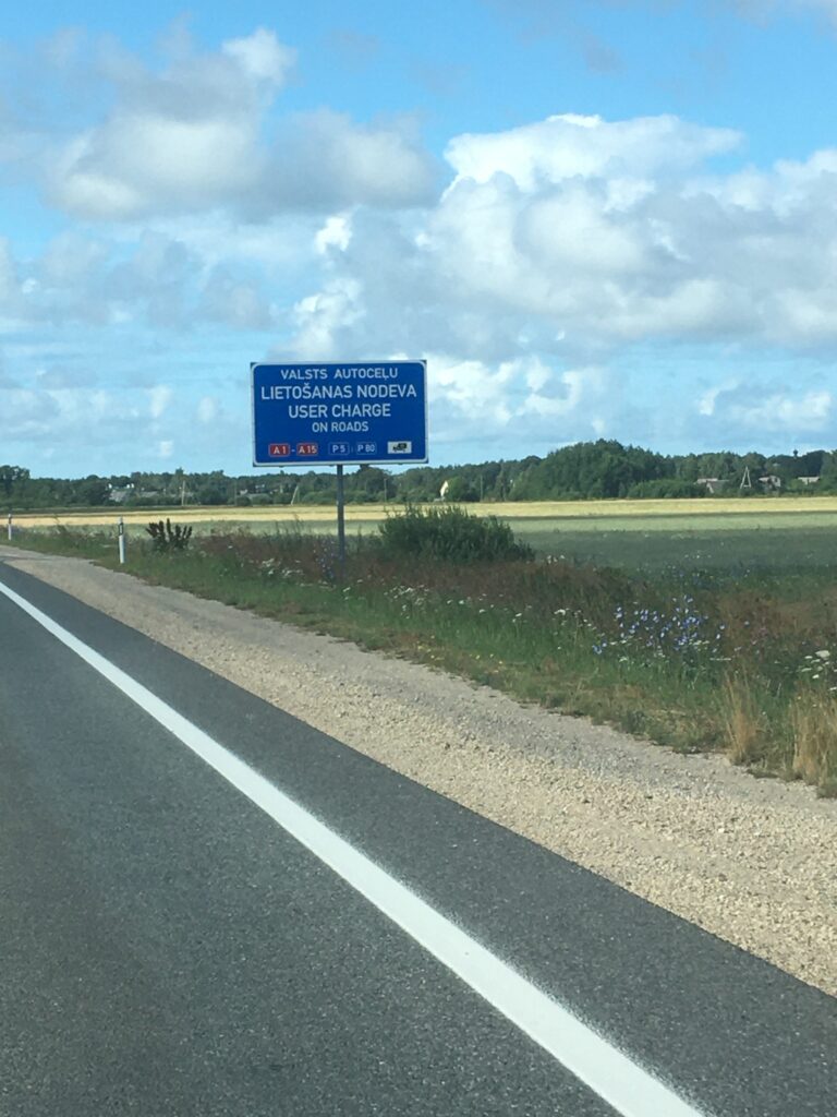 Sign indicating there's a user charge to use roads in Latvia for vehicles over 3000 kg. Ainaži, Latvia
Copyright © letsexplorehere.com